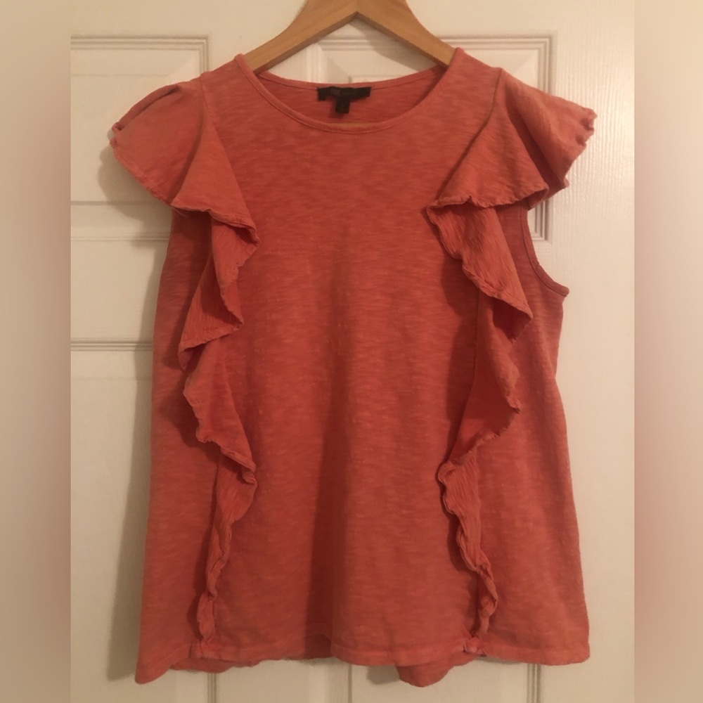 Frye top with ruffles. Very versatile piece.